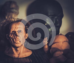 Masks and dummies on a shelf