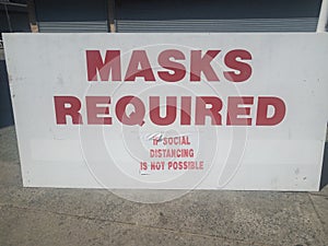 masks required if social distancing is not possible sign