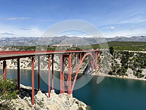 The Maslenica Bridge, a deck arch bridge carrying the D8 state road spanning the Novsko Zdrilo strait (Croatia) photo