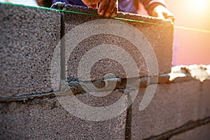 Mason block in the building construction or plaster house construction wall photo