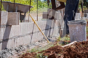 Mason/bricklayer/construction worker working on construction site