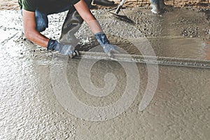 Mason building a screed coat cement photo