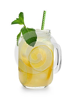 Mason jar of fresh lemonade on white background