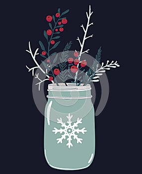 Mason jar and winter composition of red berries