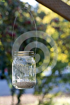 Mason Jar on wood beam