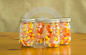 Mason jars filled with candy corn