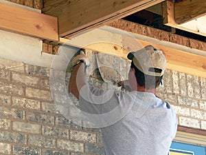 Mason laying brick photo