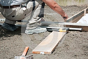 Mason preparing formwork