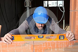 Mason with spirit level