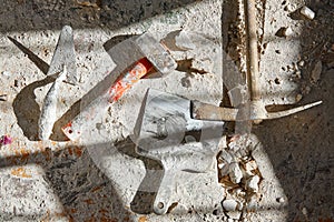 Mason tools on debris background