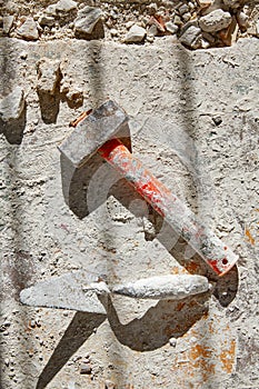 Mason tools on debris background