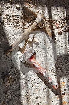 Mason tools on debris background