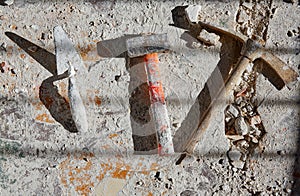 Mason tools on debris background