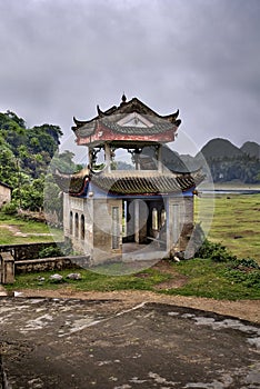 Masonry arbor pagoda in scenic farming area rural China, Guangxi.