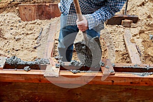 Paver laying pavement of concrete pavement blocks