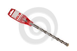 Masonry drill bit with size designation on the plastic label