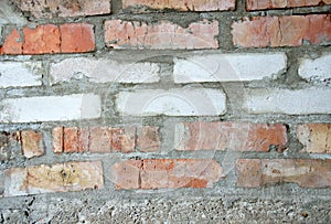 The masonry is of white and red bricks