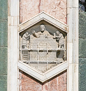 Masons building a Wall - Bas Relief in Florence