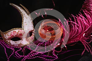 Masquerade ball holiday background with sparkling wine