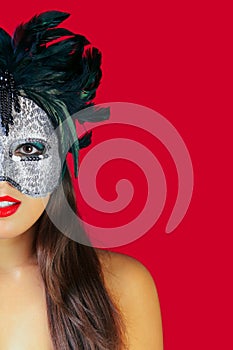 Masquerade mask red background