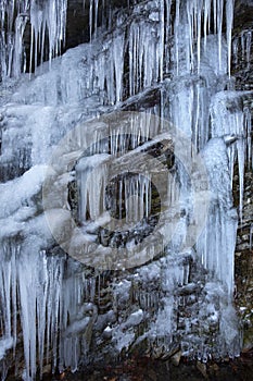 Mass of icicles draped on a cliff in Bolton, Connecticut