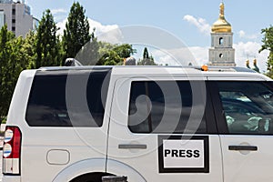 Mass media auto with sign Press in Kyiv, Ukraine. Global journalism. Documentary footage in Ukraine.