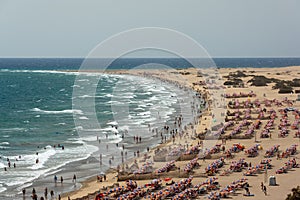 Mass tourism at beach in Playa del Ingles