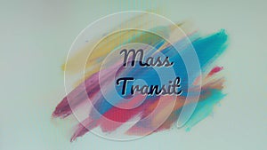 Mass transit inscription on background with strokes of multi-colored paints. Transportation concept