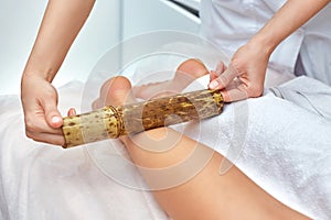 Massage with bamboo sticks