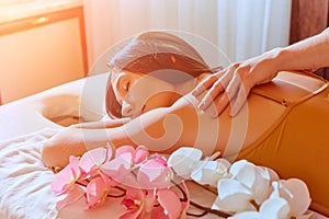 Massage . Body care. Spa body massage treatment. Woman having massage in the spa salon