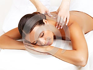 Massage. Close-up of a Beautiful Woman Getting Spa Treatment