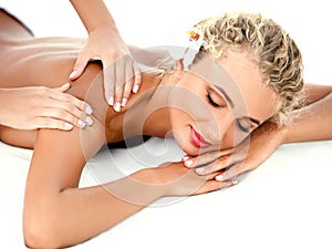 Massage. Close-up of a Beautiful Woman Getting Spa Treatment