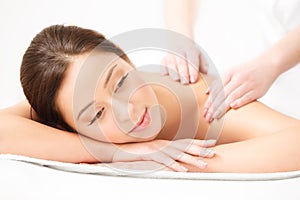 Massage. Close-up of a Beautiful Woman Getting Spa Treatment