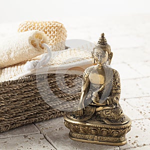 Massage and exfoliating for spa treatment with Buddha