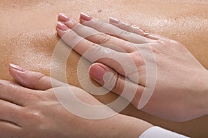 Massage of female back. Spa .