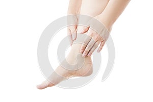 Massage of female feet isolated on white background