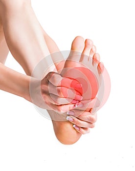 Massage of female feet. Pain in the foot. Isolated on white background.