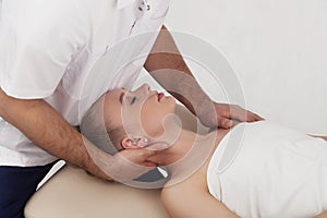 Massage of the head and cervical spine with an osteopath