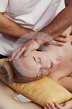 Massage of the head and cervical spine with an osteopath