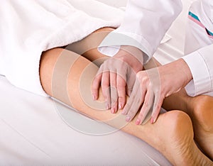 Massage of leg. Spa resort.