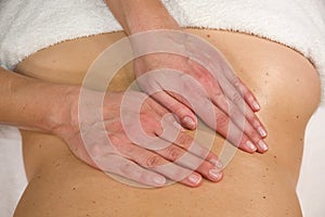 Massage at lumbar region