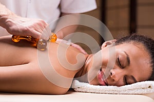 Massage with massager photo