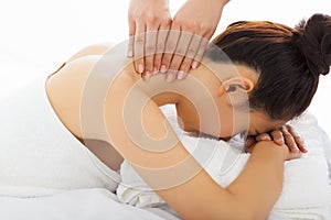 Massage of neck for woman in spa