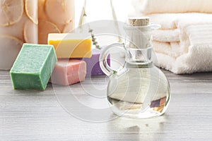 Massage oil with colored soaps