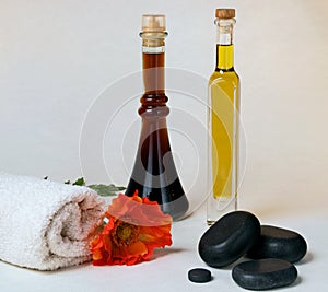 Massage oil with hot stone