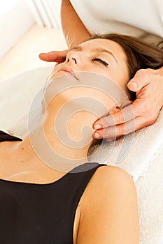 Massage and osteopathy to a woman