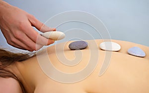 Massage procedure using round stones - Spa