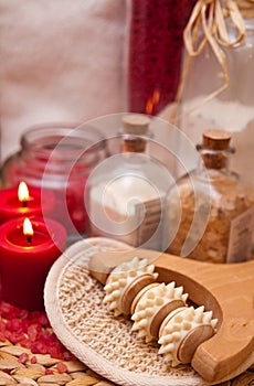 Massage roller and red candles