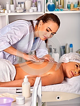 Massage therapy deals. Woman therapist making manual therapy back.