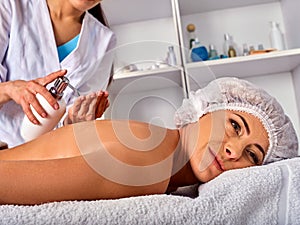 Massage woman therapist making manual therapy back.